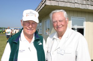 Barron Hilton (right) joined Chuck Yeager on a special Young Eagles/Make-A-Wish Foundation flight during EAA AirVenture Oshkosh 2003, in EAA’s classic 1927 Ford Tri-Motor.