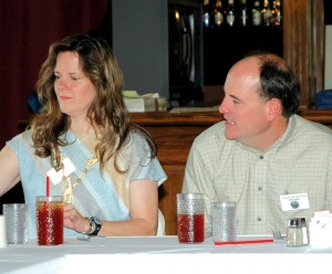 L to R: Donna Miller got a round of applause for recruiting a new member, Bill LeRoy, to the organization.