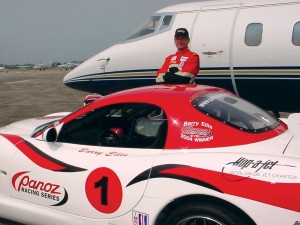 The “Number One Car” symbolic of the reigning Panoz Racing Series GT champion is flanked by Barry Ellis’ Number One ride—one of his company’s Lears.