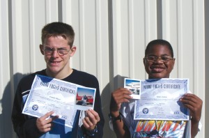 L to R: Frankie Meyer and James Anton proudly display their Young Eagles certificates. Students at the Colorado School for the Deaf and Blind, they took flights in 2004 as part of EAA Chapter 72’s Young Eagles flights for the hearing impaired.