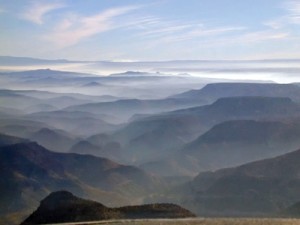 Morning mist fills valleys in Arizona’s White Mountains.