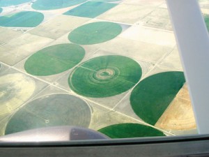 Featureless barrens give way to irrigation circles in western Kansas.