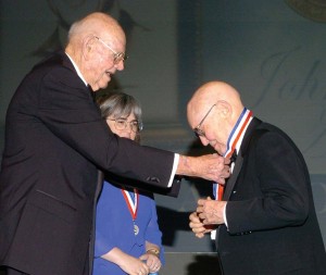 General John R. Alison, right, is presented his National Aviation Hall of Fame Enshrinement medal by longtime friend and fellow Flying Tiger Ace Tex Hill.