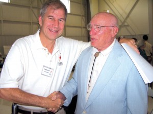 Greg Anderson, Wings Over the Rockies president & CEO, greets Bill Bower, one of the original “Doolittle Raiders.”