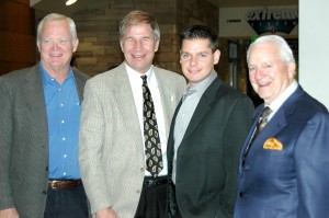 Brian Terwilliger, producer and director of “One Six Right” (second from right) poses with, from left, Aviation & Space Center of the Rockies Chairman Pat Wiesner, President and CEO Greg Anderson and former Chairman Carl Williams.