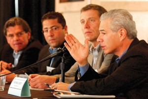 Michael Leeds, far right, leads a discussion on ethical challenges at the first annual Japha Ethics Symposium at the University of Colorado in 2003.