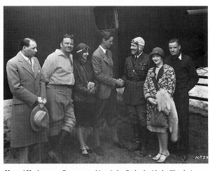 L to R: Lucien Prival, Wallace Beery, Carline Turner, Howard Hughes, Roscoe Turner, Greta Nissen and John Darrow mingle after Turner arrived at Burbank with the Sikorsky in 1928.
