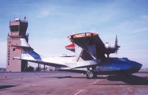 Stripped of paint, the PBY-5A rests on the ramp near the tower at Glendale Airport. This area is where the 30,000-square-foot museum building will be constructed.