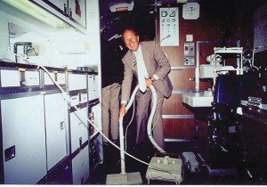 Al Ueltschi cleans the DC-8 Flying Eye Hospital.