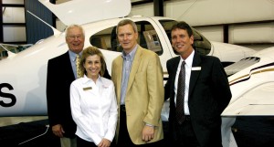 Craig Smith, Diamond sales manager (left) and Michael Hedding, director of sales, flank Premier Aircraft Sales co-owners Amy Newman and husband Lacy. Co-owner Fred Ahles isn’t pictured.