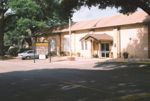 The museum entrance sign displays the name of the long-time director, the late retired Brig. Gen. C.L. Scribner.