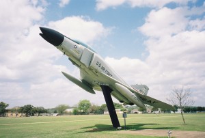 The McDonnell Douglas F-4 Phantom II, a 30-ton, supersonic fighter, was used off carrier and land bases throughout the early 1990s.