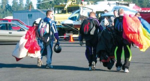 The McCall Family Fly-In represents a weekend of aviation exhibits, educational and safety seminars and entertainment. Shown are parachutists at last year’s event after landing.