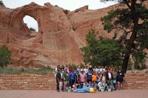 Local Girl Scouts pose with their leaders before Window Rock, from which the Navajo Nation community takes its name.