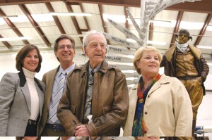 Clayton Scott, in front of the “Pathfinder” statue unveiled in his honor, with L to R, Museum of Flight CEO Bonnie Dunbar, sculpture designer Bill Jepson and Renton Mayor Kathy Keolker.