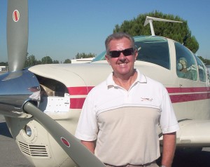 Brian Dixon, owner of ScottT’s Shirts & Things, flew into the picnic in his V35B Beech Bonanza.