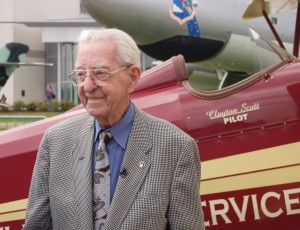 Clayton Scott poses with this 1928 Travel Air biplane at The Museum of Flight in July 2005, during his 100th birthday celebration.
