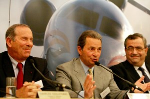 L to R: Charles Edelstenne, chairman and president, Dassault Aviation; Richard Santulli, CEO, NetJets; and Jean Rosanvallon, president and CEO, Dassault Falcon Jet, answer questions about their agreement.