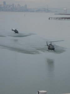 During a sequence in NBC’s “Fear Factor,” Craig Hosking races across San Francisco Bay in the lead Huey, as a camera crew chases him.