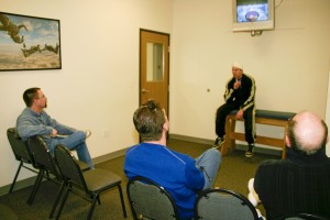 L to R: Tom, Michael and Jim Scott receive personal and video instruction before their bodyflight experience.