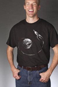 Though he doesn’t often dabble in two-dimensional art, Erik Lindbergh created this “Embryonic Escape” T-shirt, which he says represents our collective human potential.