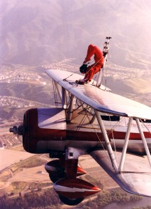 In her unique interpretation of an aerial handstand, Margaret Stivers performs her forearm stand on top of the Stearman’s top wing.