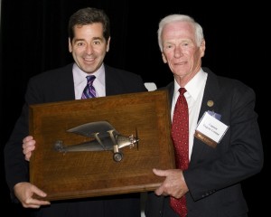 St. Louis sculptor Don F. Wiegand created the Spirit Award, a bronze bas-relief of the Spirit of St. Louis, presented to Gene Cernan (right). Miles O’Brien (left) served as master of ceremonies.