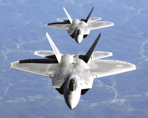The F-22 Raptor is a fifth-generation stealth fighter. It carries air-to-air missiles in internal bays to avoid disrupting its stealth capability. Its speed is estimated to exceed Mach 2.