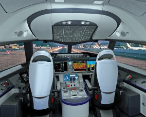 The cockpit of the new 787 has improved visibility and a clean, uncluttered appearance enhanced by glass-cockpit navigation panels.