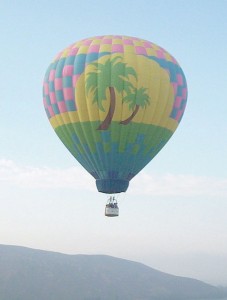 Each balloon was unbundled with the basket on its side. When inflated with hot air from the propane burners, the balloon rose and the basket tilted upright.