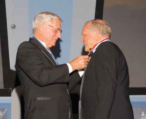 Dick Rutan, a 2002 enshrinee, presented enshrinement to fellow adventurer Steve Fossett.