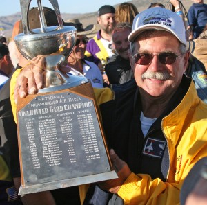 John Penney proudly holds up the Unlimited Gold trophy.