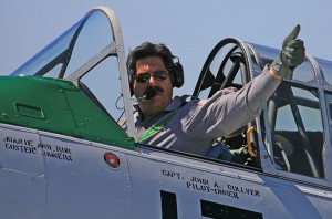 Veteran pilot John Collver gives the crowd a thumbs up from the cockpit at the end of his flight.