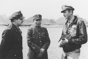 Col. Tex Hill (right) converses with General Chow Chi-Rao, titular chief of the Chinese Air Force, and a Chinese-American Composite Wing commander during an inspection of the CACW at Kweilin, in 1944.