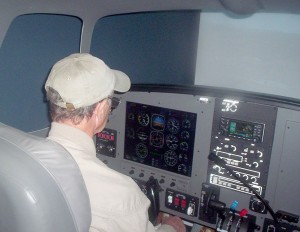 After I crashed a couple of times in Hollywood Aviators’ FTD, private pilot Peter Helms (shown), had little trouble operating it properly. Jay McDaniel, a computer flight simulator programmer, flew it perfectly. I must be getting rusty!