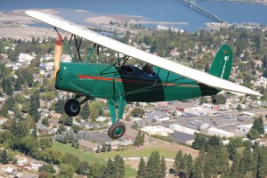 This 1937 Fairchild 22C7B flying over Hood River, Ore., is one of more than a dozen aircraft in the museum’s collection representing the 1930s.