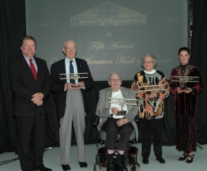 L to R: Mike Burrill poses with Brig. Gen. Staryl C. Austin Jr., Col. James Church, the wife of Col. Lawrence E. Campbell Jr. and the daughter of Nevilles E. “Jim” Walker. Wright Flyer trophies were presented to Oregon Aviation Hall of Honor recipients.