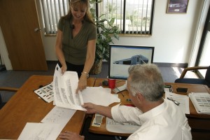 Sue Kelly, EagleSpan’s office manager, helps Jerry Curtis run business smoothly at headquarters.