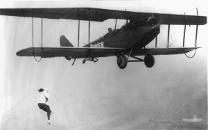 Lillian Boyer, featured in the documentary, hangs from the wing of a JN-4 “Jenny” biplane. Boyer left her job as a waitress to become a wing walker.
