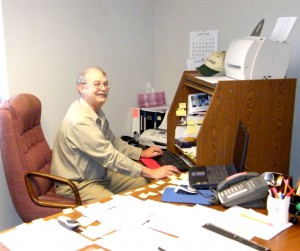 Seated at his workstation is ESS site manager Bill Clingenpeel.