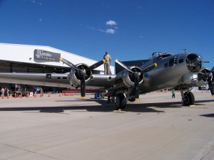 Members of EAA Warbirds of America fly the Boeing B-17G Flying Fortress, Aluminum Overcast, powered by four 1,200-hp Wright Cyclone piston engines.