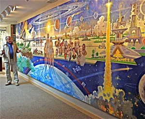 Bob McCall speaks to ASAA members about his mural, “Cosmic Revolution,” in the Bellevue, Wash., headquarters of The Foundation for the Future.