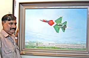 S.M.A. Hussaini of Pakistan shows his painting, “JF-17 Thunder Makes Public Debut.”