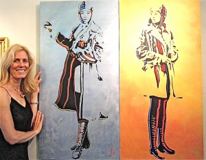 Artist Mimi Stuart is pictured with her painting, “Mastery: Bess Coleman Mystery: Amelia Earhart.”