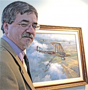 Mike O’Neal, WWI artist and historian, shows his painting, “Valentine’s Day,” which shows Lt. Valentine Burger downing a German ace.