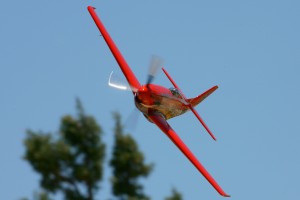 Dan Martin flew the highly modified P-51 Mustang, Dago Red, to second place in the Unlimited Gold race.