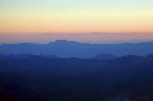 The sun sets over Four Peaks as we steer toward Scottsdale.