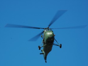 The Marine Corps Sikorsky U-34 is making a low pass over the crowd. This was its first appearance at the show since the Marine Helicopter Squadron 361 Veterans Association (working as Freedom’s Flying Memorial) restored it to flying condition.